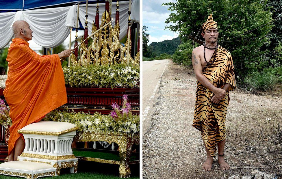 A monk lights a candle at an altar near the Tham Luang cave and a hermit performs a ritual