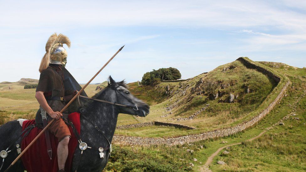 Roman soldier looking at Hadrian's wall