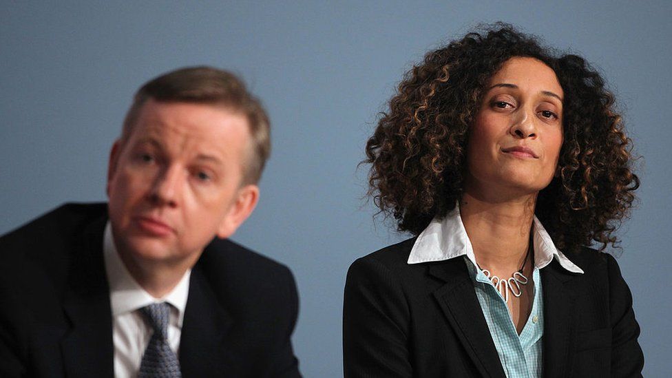 A file image of Katharine Birbalsingh sitting next to Michael Gove at an event