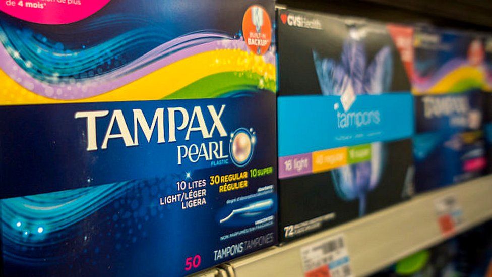 Packages of Tampax brand tampons on a drugstore shelf in New York.