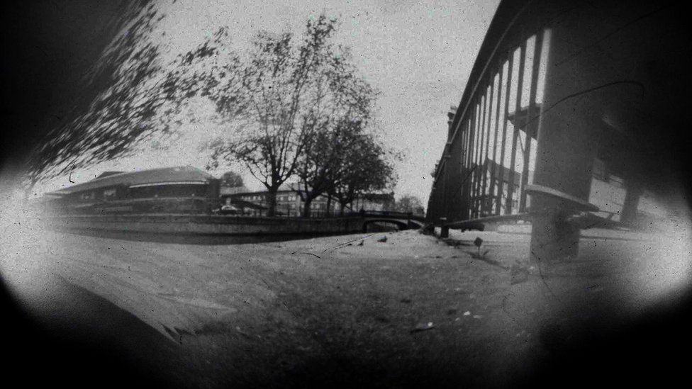 Pinhole view of some buildings