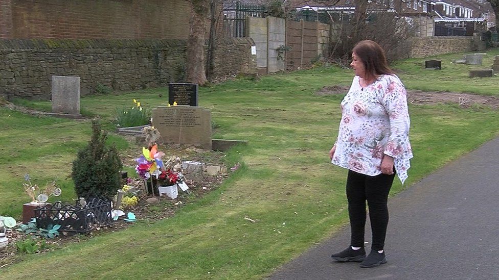 Julie at the grave