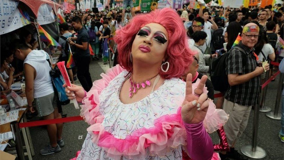 A participant poses during the annual Taiwan lesbian, gay, bisexual and transgender pride parade in Taipei on 29 October 2016.