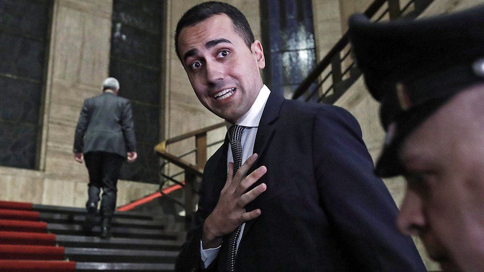 Luigi di Maio speaks to journalists at the end of a meeting at his ministry in Rome, 21 January 2019