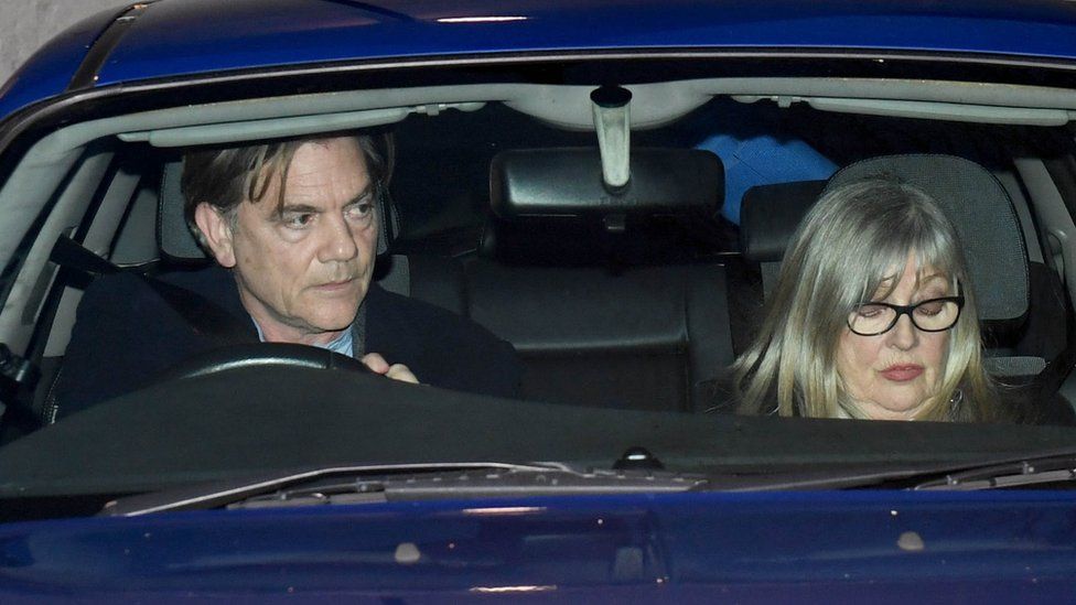 John Michie and Carol Fletcher-Michie leave court in their car