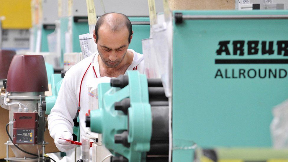 Worker at India-Dreusicke engineering firm in Berlin, 2008 file pic