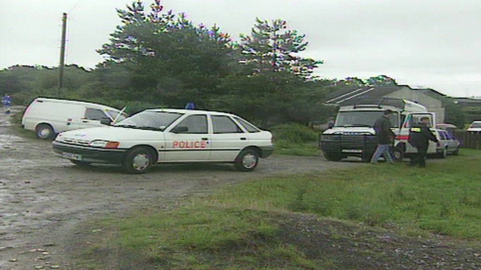 Police vehicle's at the Tooze's home