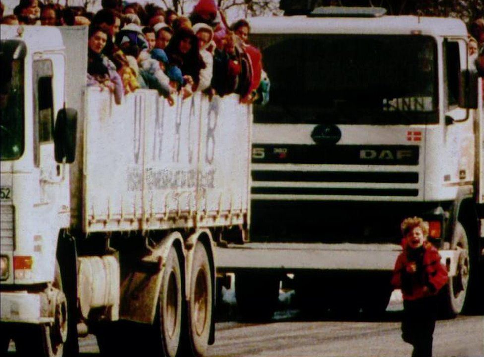 UN lorries carry refugees from Srebrenica on 31 March 1993