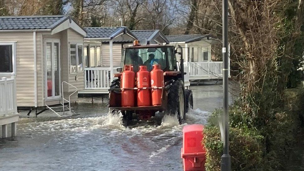 Tractor in floods at Kiln Park