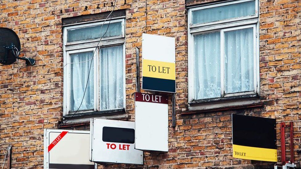To Let signs on house