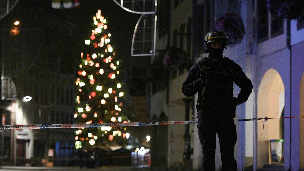 A policeman patrols in the rue des Grandes Arcades in Strasbourg, eastern France, after a shooting breakout, on December 11, 2018