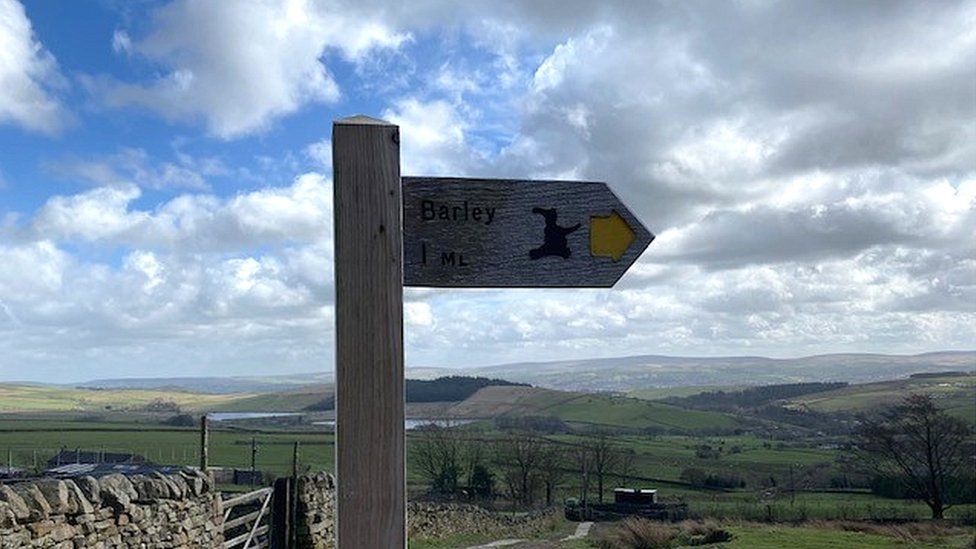 Signpost for Barley features a witch in a nod to the Pendle witch trials