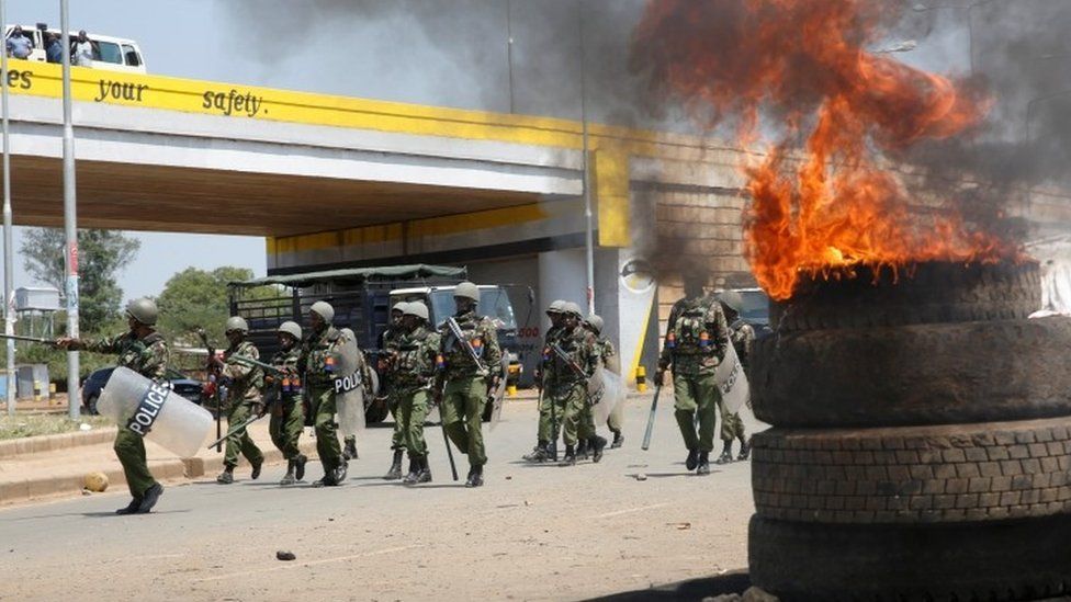 Riot policemen arrive to disperse supporters of opposition leader Raila Odinga, after their political leader claimed "massive" fraud in this week's elections, in Kisumu,