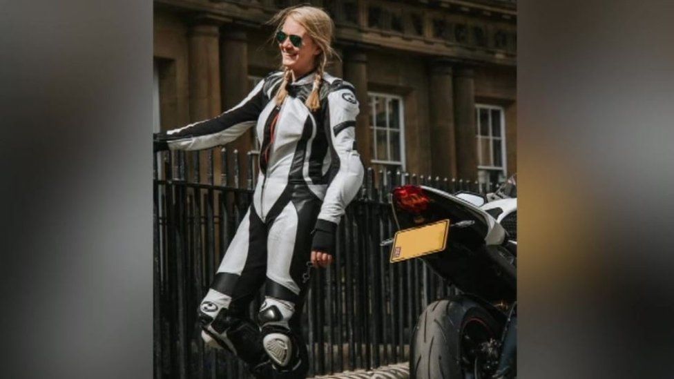 Steph Robertson beside her motorbike