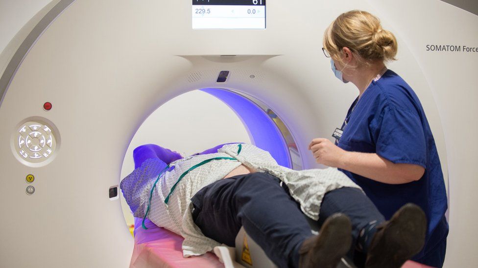 A patient is prepared for a CT scan at the Royal Papworth Hospital, Cambridge.