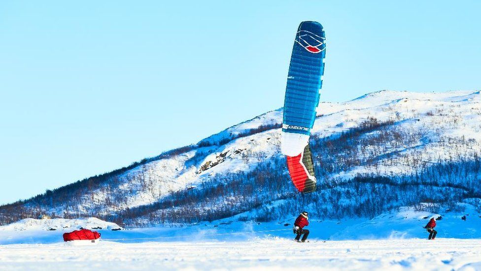 Kite-skiing during one of their training expeditions