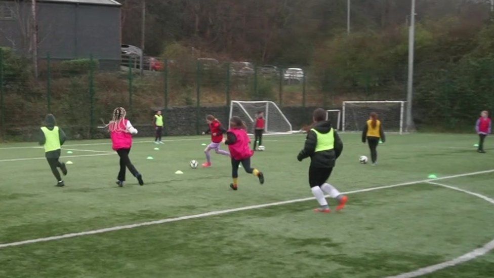 Children playing football