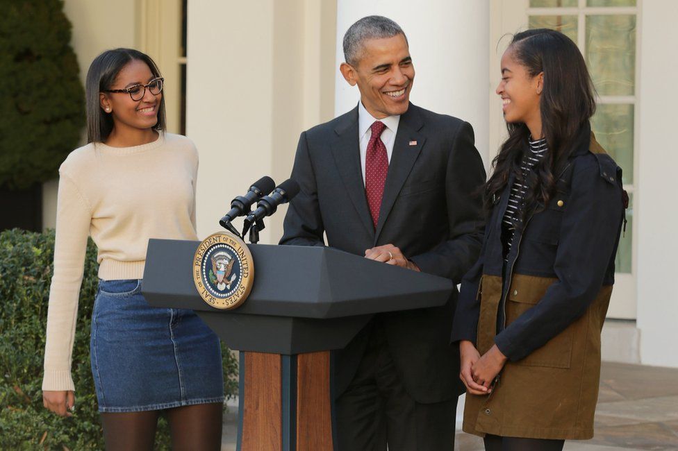 Sasha, Barack and Malia at the annual turkey pardoning ceremony in the Rose Garden at the White House November 25, 2015 in Washington, DC