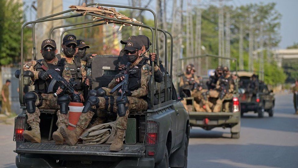 Pakistan's army commandos depart in their vehicles in 2021