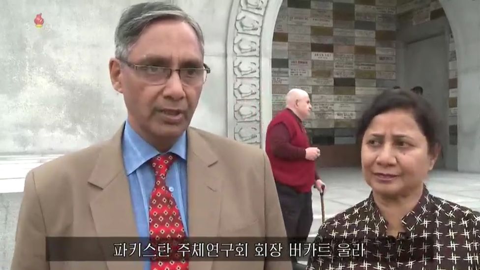 The chair of Pakistan's Juche study group and his wife are shown visiting Pyongyang for the Day of the Sun.