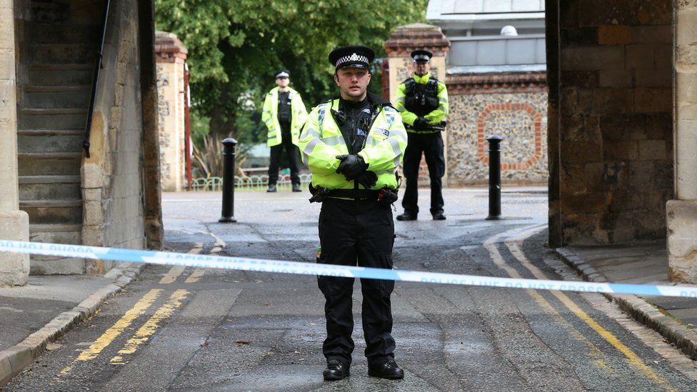 Police at the Abbey gateway of Forbury Gardens in Reading following a multiple stabbing
