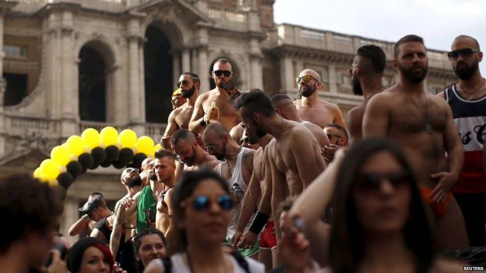 Participants take part in a Gay Pride parade in Rome, Italy, 13 June 2015