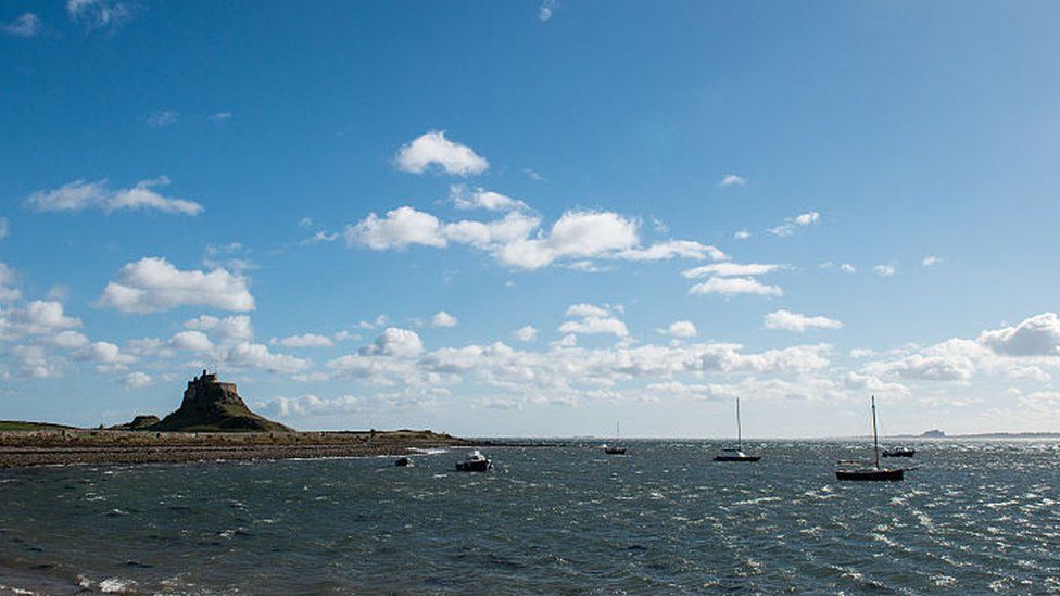 Small boats off Holy Island