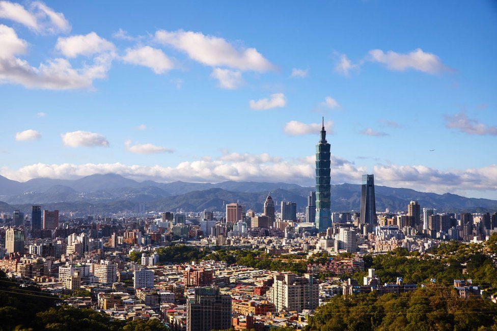 Taipei 101 and the nearby Nanshan Plaza dominate Taipei's skyline when viewed from the south of the city. (