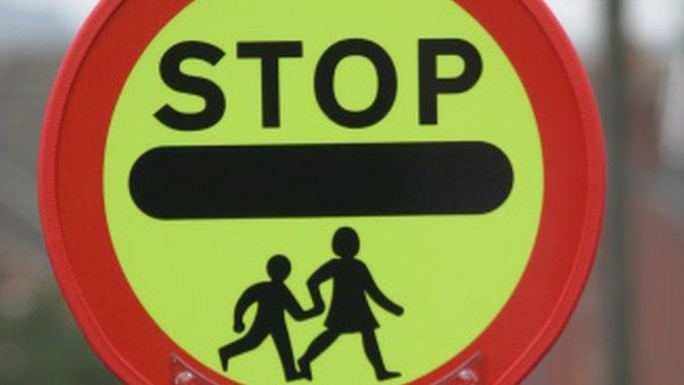 School patrol stop sign