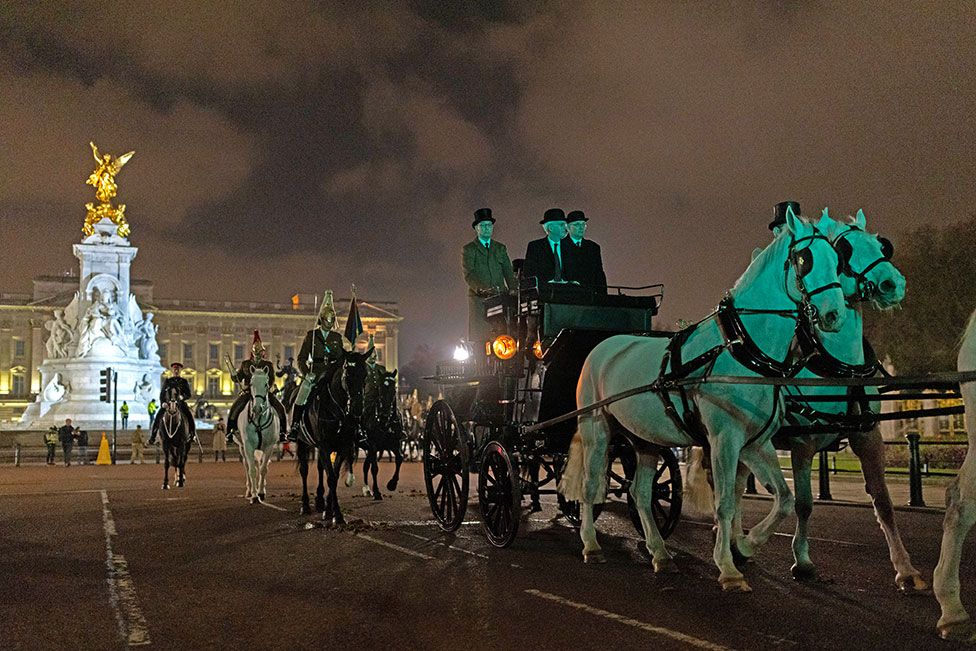 A night time rehearsal for the coronation of King Charles III processes down The Mall on 18 April 2023 in London, England