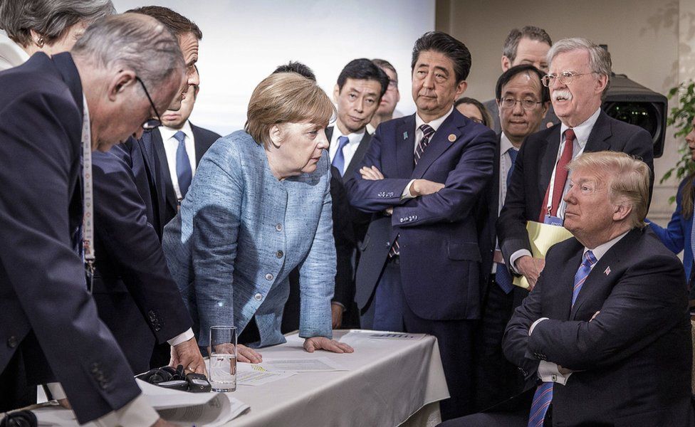 Donald Trump and G7 officials