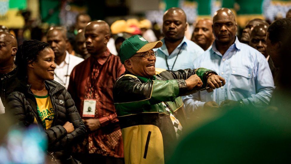 South African President and former President of the ANC Jacob Zuma departs following the closing ceremony on the final day of the 54th ANC conference at the NASREC Expo Centre in Johannesburg.