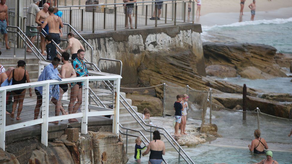 Swimmers and beachgoers at Bronte Beach in Sydney on Tuesday