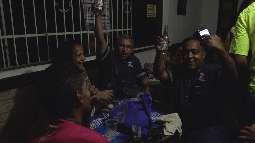 Maduro supporters in a bar