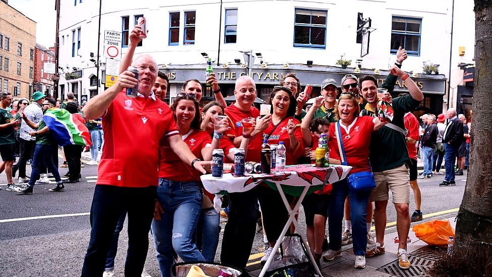 Drinkers with their own alcohol in Cardiff City Centre