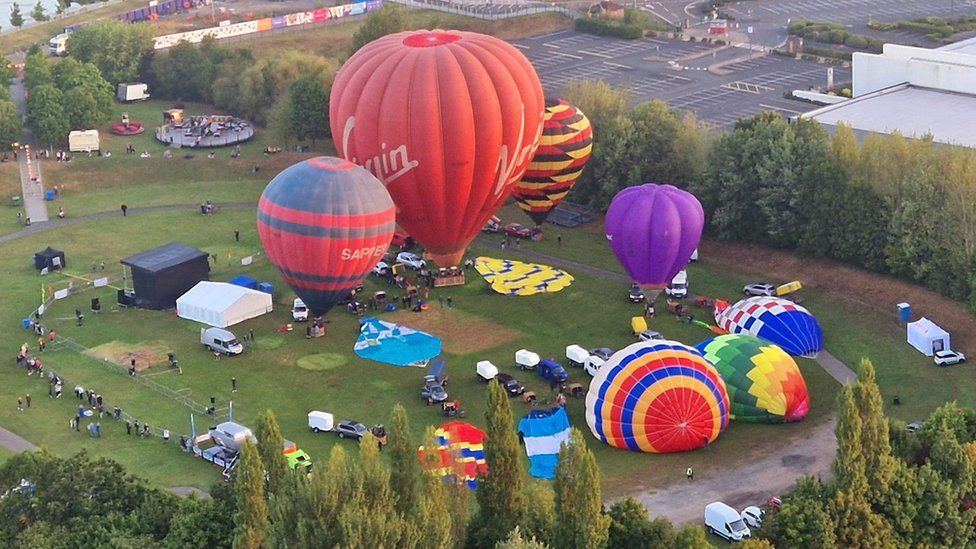Hot air balloons in park