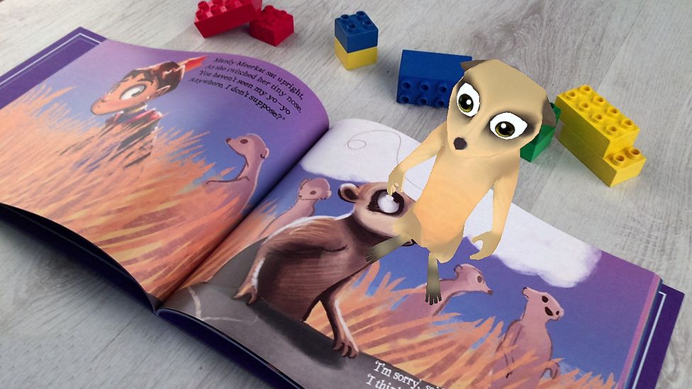 Augmented reality character superimposed on picture book