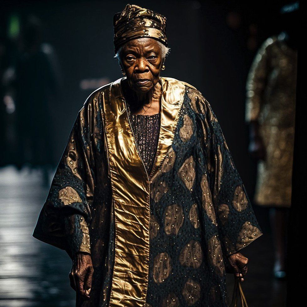 Woman with a gold dress on runway