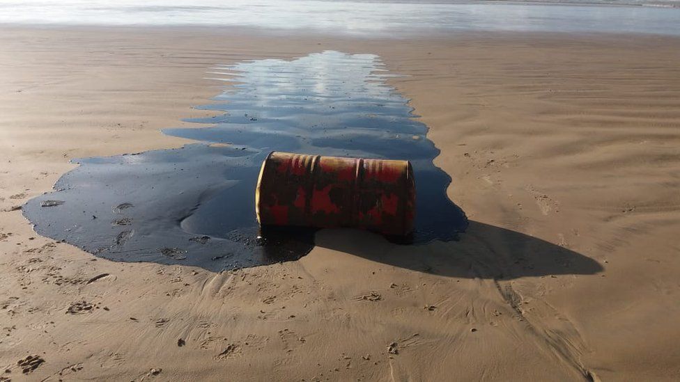 Barrel of oil on Brazilian beach