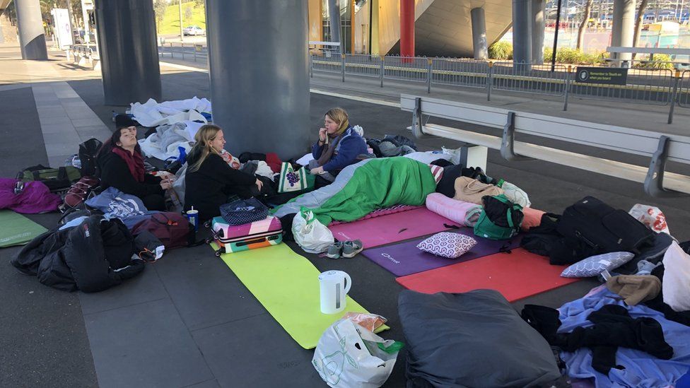 Extreme queuing: Five days in line to see favourite band - BBC News