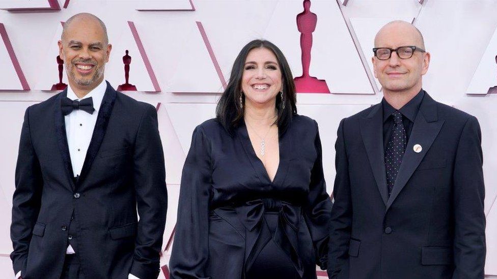 Jesse Collins, Stacey Sher and Steven Soderbergh at the 2021 Oscars