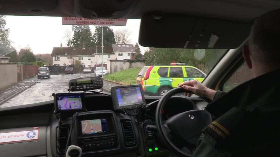 In the drivers seat of an ambulance