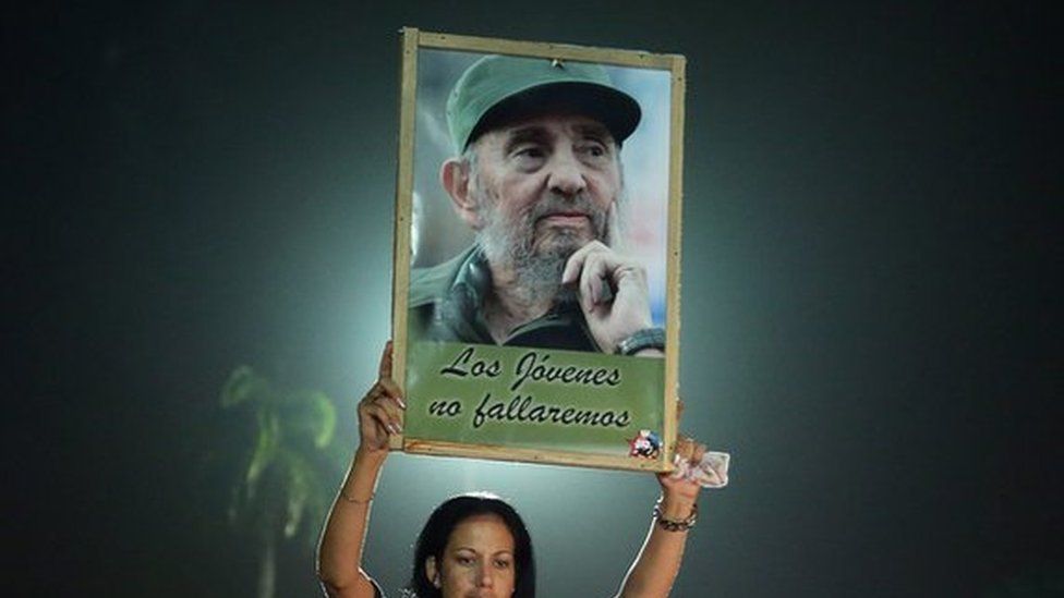Dozens of people participate in a vigil commemorating late Cuban leader Fidel Castro in Camaguey, Cuba