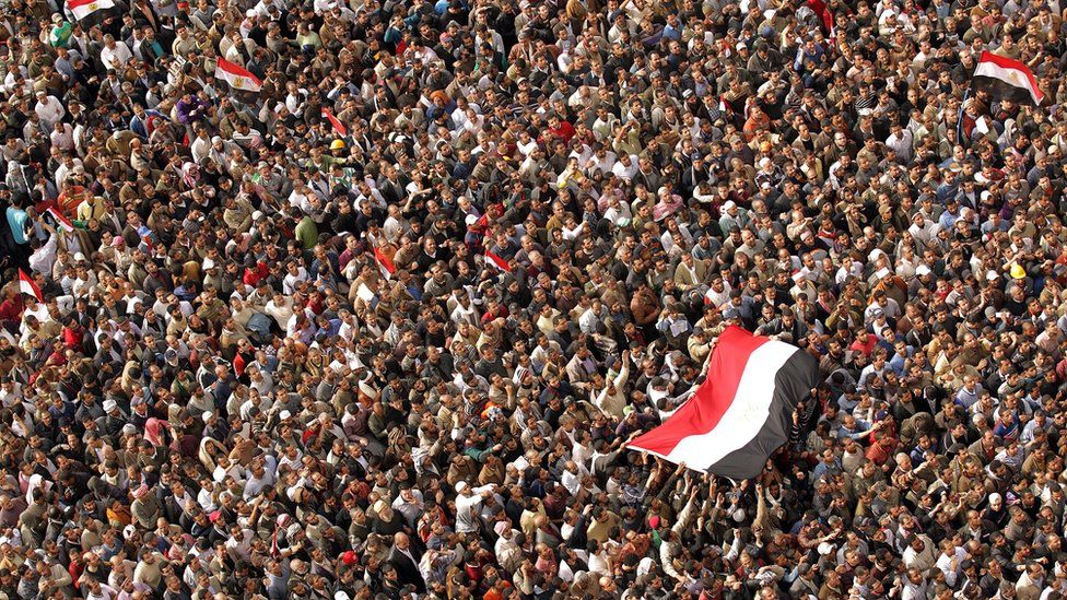 Egyptian anti-government protesters gather at Cairo's Tahrir Square on February 4, 2011