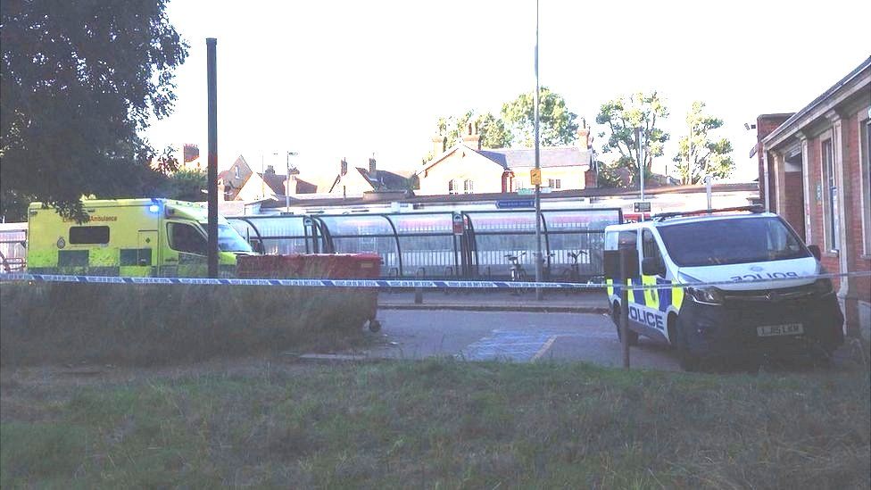 An ambulance and a police van at Wandsworth Common train station