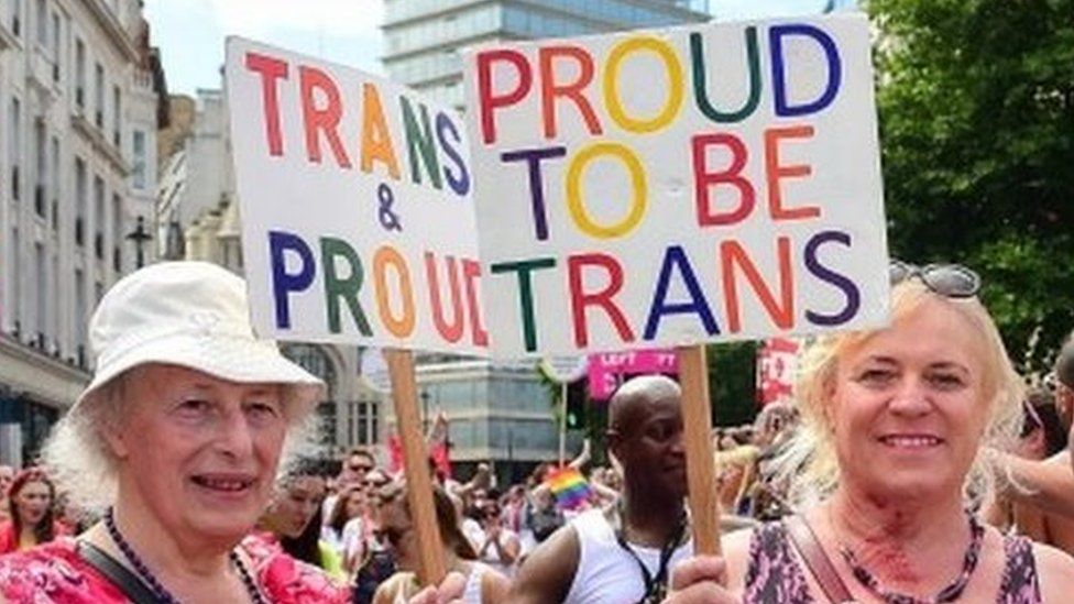 Transgendered pensioner Margaret Pepper (formerly Maurice), 73 (L) holds a placard "trans and Proud" as she takes part in London Pride parade in London, Britain, 08 July 2017.
