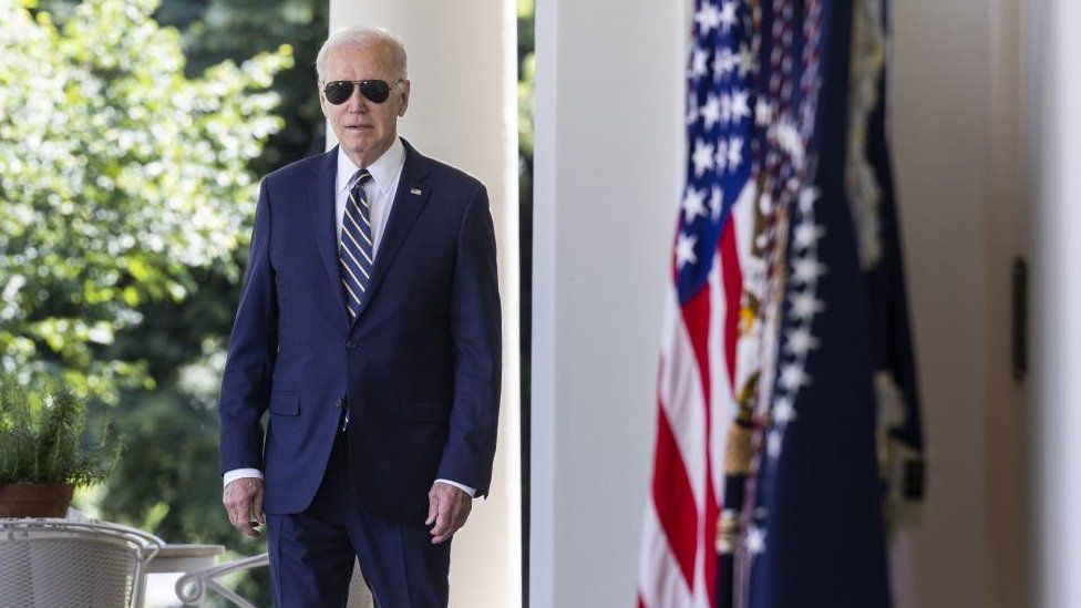 President Joe Biden pictured at the White House wearing sunglasses