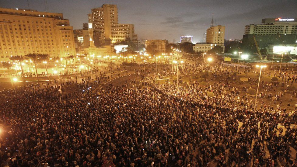 Photo taken on 25 January 2011 shows Egyptian demonstrators protesting in central Cairo against then President Hosni Mubarak