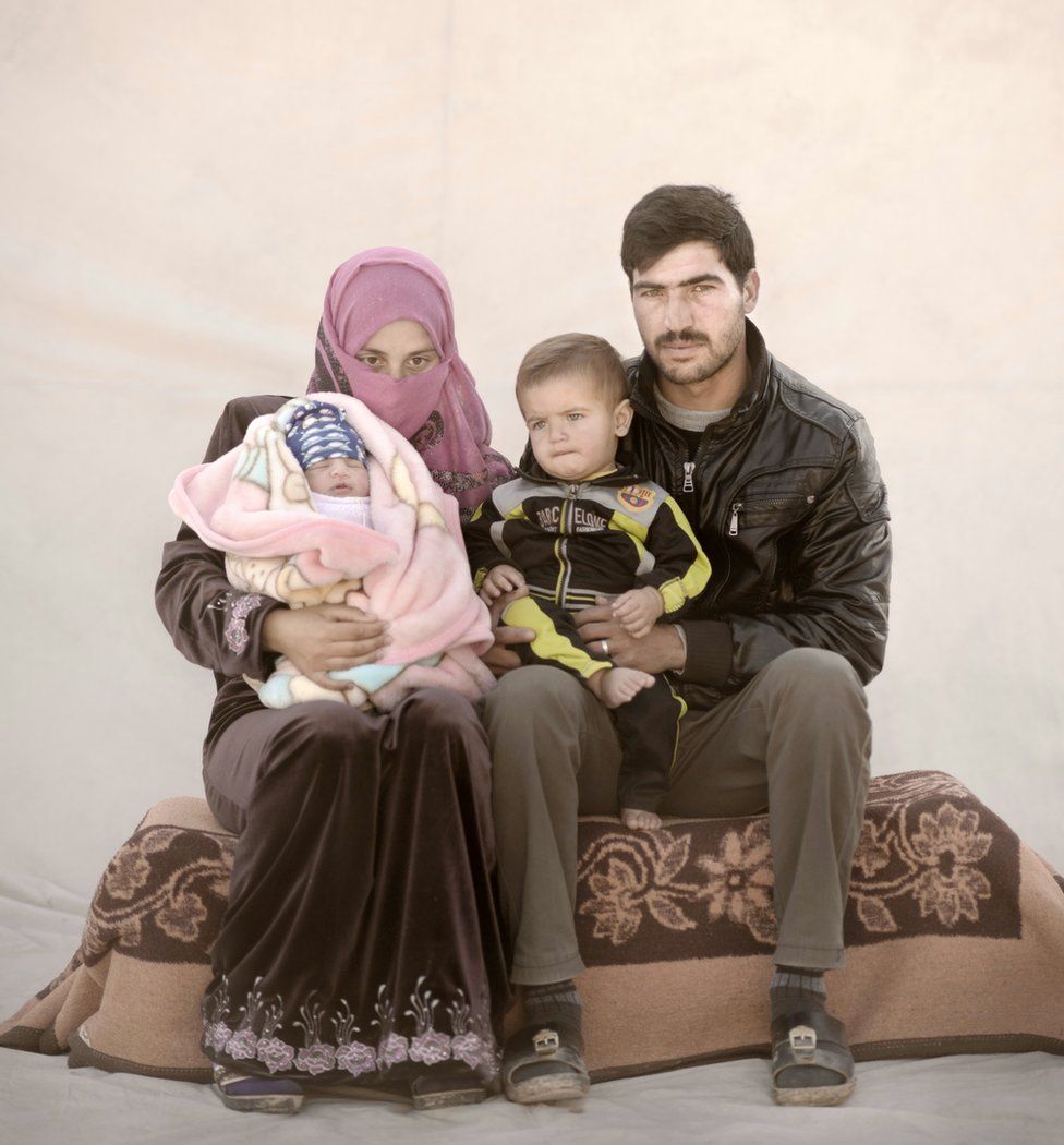 Amira with her husband and two children