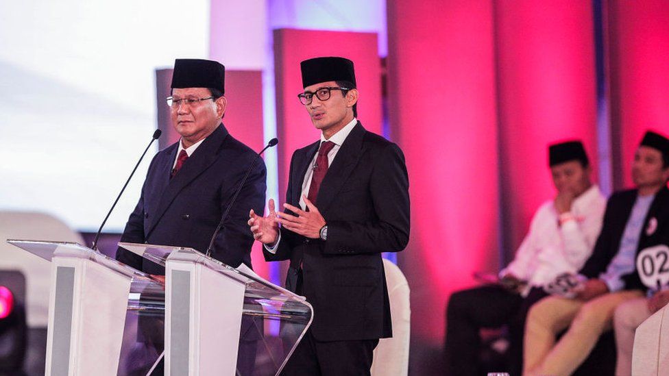 Presidential candidate Prabowo Subianto (L) and his running mate Sandiaga Uno (R)